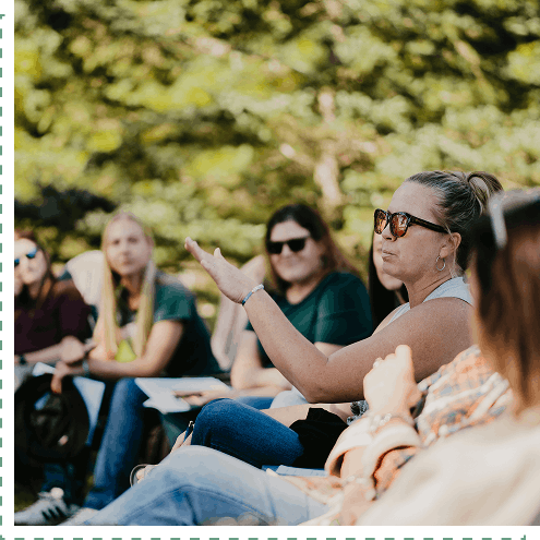 A retreat participant sharing thoughts with the group