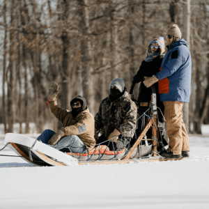 Retreat participants on sled dog sled