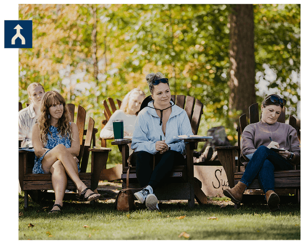 Group of retreat participants listening during session