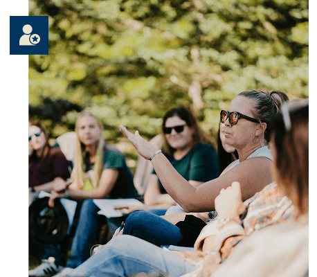 A retreat participant sharing thoughts with the group
