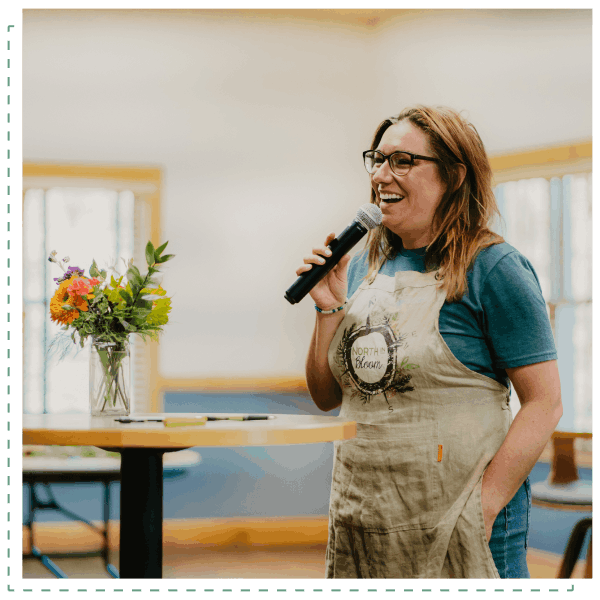 Group leader speaking into a microphone