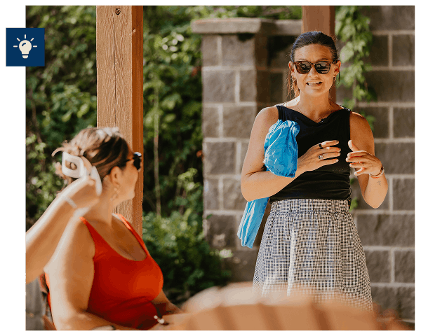 Retreat facilitator speaking to group of participants