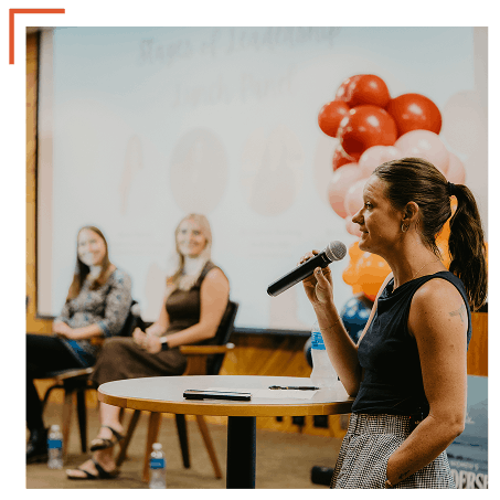 Business Dev-min Retreat facilitator and panel speaking to participants
