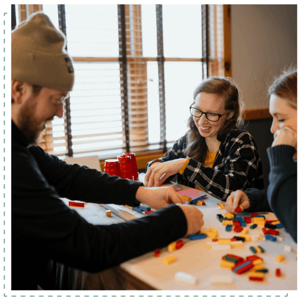 Retreat participants collaborating on an activity