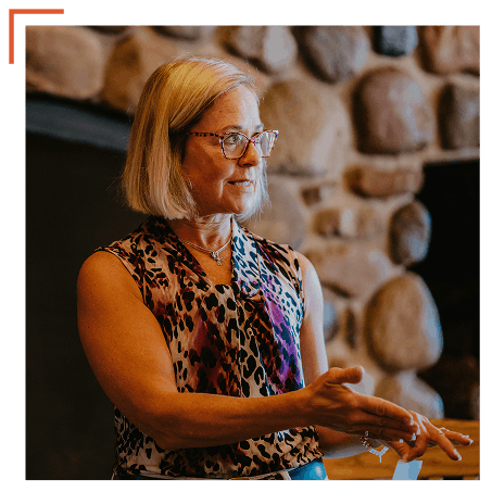 Leadership and Development-min Retreat facilitator speaking to participants