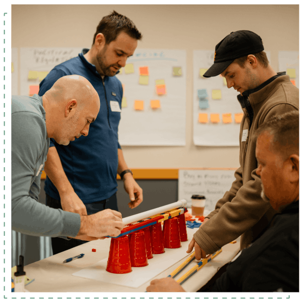 Prouty L3-1-min Retreat participants working together on an experiential learning activity